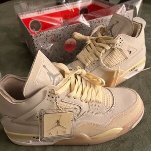 Off White x Air Jordan 4 1:1 replicas in the sail colorway